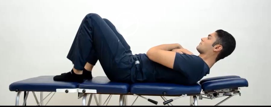 How to Recover from CrossFit Back Injury? 3 Doing partial sit up to avoid crossfit back injury.